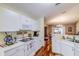 Bright, well-maintained kitchen with modern appliances and hardwood floors at 2031 Wekiva Reserve Blvd, Apopka, FL 32703
