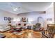 Cozy living room featuring hardwood floors, comfortable couches, and warm, inviting decor at 2031 Wekiva Reserve Blvd, Apopka, FL 32703