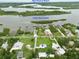 Aerial view of New Smyrna Beach and Indian River North with waterfront homes at 216 N Riverside Dr, Edgewater, FL 32132