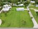 Expansive aerial view of a home with large yard, showcasing its lush greenery and neighborhood setting at 216 N Riverside Dr, Edgewater, FL 32132