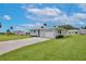 Charming home with a lush green lawn, showcasing a clean and well-maintained exterior at 216 N Riverside Dr, Edgewater, FL 32132