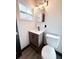 Updated bathroom featuring modern vanity, fixtures, and plenty of natural light at 2342 Alice Ave, Eustis, FL 32726