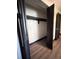 Spacious closet with ample storage shelves and an open door at 2342 Alice Ave, Eustis, FL 32726
