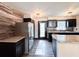 Spacious kitchen featuring stainless steel appliances, granite counters, and stylish backsplash at 2342 Alice Ave, Eustis, FL 32726