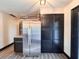 Open kitchen design with stainless steel refrigerator and plenty of cabinet storage at 2342 Alice Ave, Eustis, FL 32726