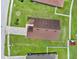 Aerial view of the house showing the roof, driveway, and landscaping at 2713 Eagle Glen Cir, Kissimmee, FL 34746
