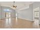 Spacious living room featuring tiled flooring, high ceilings, and natural light from french doors at 2713 Eagle Glen Cir, Kissimmee, FL 34746