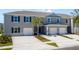 Charming townhome with a well-manicured lawn, a private garage and an inviting entrance at 2722 Golden Trout Ln, Edgewater, FL 32141