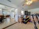 Spacious bonus room shows flexible layout, tile flooring, and access to many rooms at 2728 Hertha Ave, Orlando, FL 32826