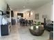 Open-concept living space with a kitchen, dining area, and comfortable living room at 2824 Neverland Dr, New Smyrna Beach, FL 32168