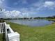 Beautiful view of pond surrounded by lush greenery at 2824 Neverland Dr, New Smyrna Beach, FL 32168