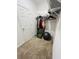 Walk-in closet with carpet and wire shelving provides efficient storage in the house at 2824 Neverland Dr, New Smyrna Beach, FL 32168