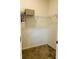 Walk-in closet with carpet and wire shelving provides efficient storage in the house at 2824 Neverland Dr, New Smyrna Beach, FL 32168