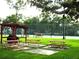 Community picnic area offering sheltered seating and a barbecue for enjoyable outdoor gatherings at 2864 N Powers Drive # 156, Orlando, FL 32818
