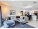 Comfortable living room featuring a large sectional sofa and modern decor at 3010 Secret Lake Dr, Kissimmee, FL 34747