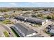 Aerial shot of townhome community showing parking and green spaces at 3308 Tranquil Trl, Kissimmee, FL 34747