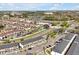 Expansive aerial view of a well-planned community with neat rows of townhomes, lush landscaping, and convenient parking at 3308 Tranquil Trl, Kissimmee, FL 34747