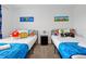 Close up of fun Mario Bros themed bedroom with twin beds at 3308 Tranquil Trl, Kissimmee, FL 34747