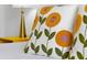 Close-up of bedroom decor featuring sunny yellow sunflower pillows and stylish lamps at 3308 Tranquil Trl, Kissimmee, FL 34747