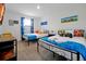 Fun bedroom with Mario Bros themed decor and comfortable twin beds at 3308 Tranquil Trl, Kissimmee, FL 34747