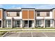 Attractive townhome featuring stylish exterior design at 3308 Tranquil Trl, Kissimmee, FL 34747