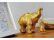 Charming desk decor with a golden elephant figurine at 3308 Tranquil Trl, Kissimmee, FL 34747