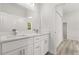 Bathroom boasts double sinks, quartz counters, and modern fixtures at 4345 Sw 143Rd Lane Rd, Ocala, FL 34473