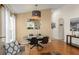 Elegant dining area featuring modern lighting, tile flooring, and comfortable seating at 462 Lakepark Trl, Oviedo, FL 32765