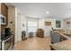 Bright kitchen area featuring tile floors, stainless steel appliances, and lots of light at 462 Lakepark Trl, Oviedo, FL 32765