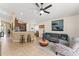 Comfortable living room featuring a modern sofa and decorative accents at 462 Lakepark Trl, Oviedo, FL 32765