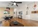 Spacious living area with tile flooring, modern furnishings, and ample natural light at 462 Lakepark Trl, Oviedo, FL 32765