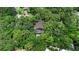 Bird's-eye view of home surrounded by verdant trees; offering privacy and seclusion at 4702 Shorecrest Dr, Orlando, FL 32817