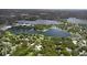 Stunning aerial view showcasing the serene lakes and lush green landscapes at 4702 Shorecrest Dr, Orlando, FL 32817