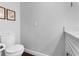 This half bath is accented by neutral walls, a modern toilet, and a sleek countertop sink at 4702 Shorecrest Dr, Orlando, FL 32817