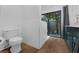 Updated bathroom with white tile and walk-in shower at 4702 Shorecrest Dr, Orlando, FL 32817