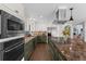 Updated kitchen with stainless steel appliances and updated countertops at 4702 Shorecrest Dr, Orlando, FL 32817