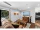 Cozy living room with wood floors and access to the backyard at 4702 Shorecrest Dr, Orlando, FL 32817