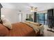 Main bedroom with ceiling fan and private access to the back yard at 4702 Shorecrest Dr, Orlando, FL 32817
