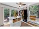 Walk-in closet with custom shelving and natural light at 4702 Shorecrest Dr, Orlando, FL 32817