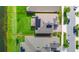 Aerial view of rooftop of home with solar panels, backyard and waterfront views at 4908 Lotta Ct, St Cloud, FL 34772