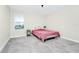 Comfortable bedroom with neutral carpet and large window bringing in lots of natural light at 4908 Lotta Ct, St Cloud, FL 34772