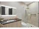 Modern bathroom featuring a glass walk-in shower, sleek vanity, and designer tile work at 5074 Isleworth Country Club Dr, Windermere, FL 34786