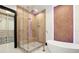Modern bathroom with glass enclosed shower and soaking tub at 5074 Isleworth Country Club Dr, Windermere, FL 34786