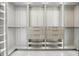 Spacious walk-in closet with custom shelving and ample storage space at 5074 Isleworth Country Club Dr, Windermere, FL 34786