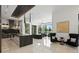 Open concept living room featuring stylish furniture, with large windows to let in plenty of light at 5074 Isleworth Country Club Dr, Windermere, FL 34786