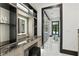 This vanity boasts a built-in lighted mirror and plenty of storage at 5074 Isleworth Country Club Dr, Windermere, FL 34786