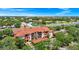 Aerial view of complex near a commercial area, with a central location and lush landscaping at 5566 Metrowest Blvd # 10, Orlando, FL 32811