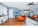 Spacious living area with open layout, modern furnishings, and bright natural light at 5566 Metrowest Blvd # 10, Orlando, FL 32811
