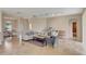 Comfortable living room with tiled floors, neutral walls, plush seating, and elegant decor with ample space at 5819 Covington Cove Way, Orlando, FL 32829