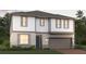 Two-story home with a two-car garage, gray roof, and neutral color palette at 5928 Ali Grace Dr, St Cloud, FL 34771